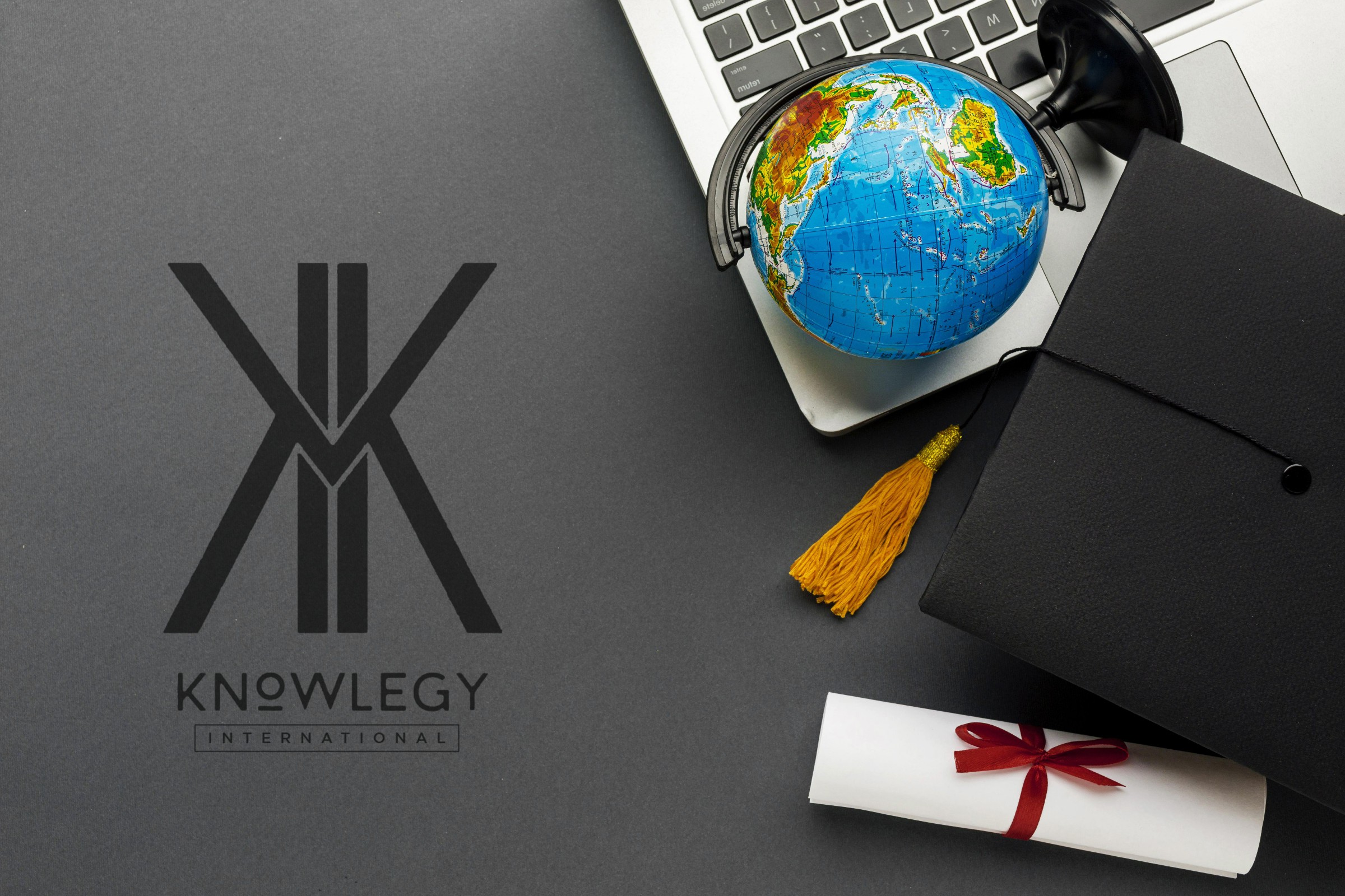 FormatFactorytop-view-laptop-with-diploma-globe